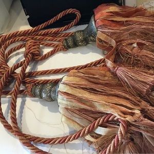 Tassels. 12”. Rust with metal design. Pair
